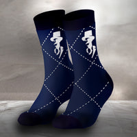 Navy blue socks with white geometric pattern and face design on a neutral background