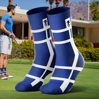 Blue socks with white patterns on a golf course