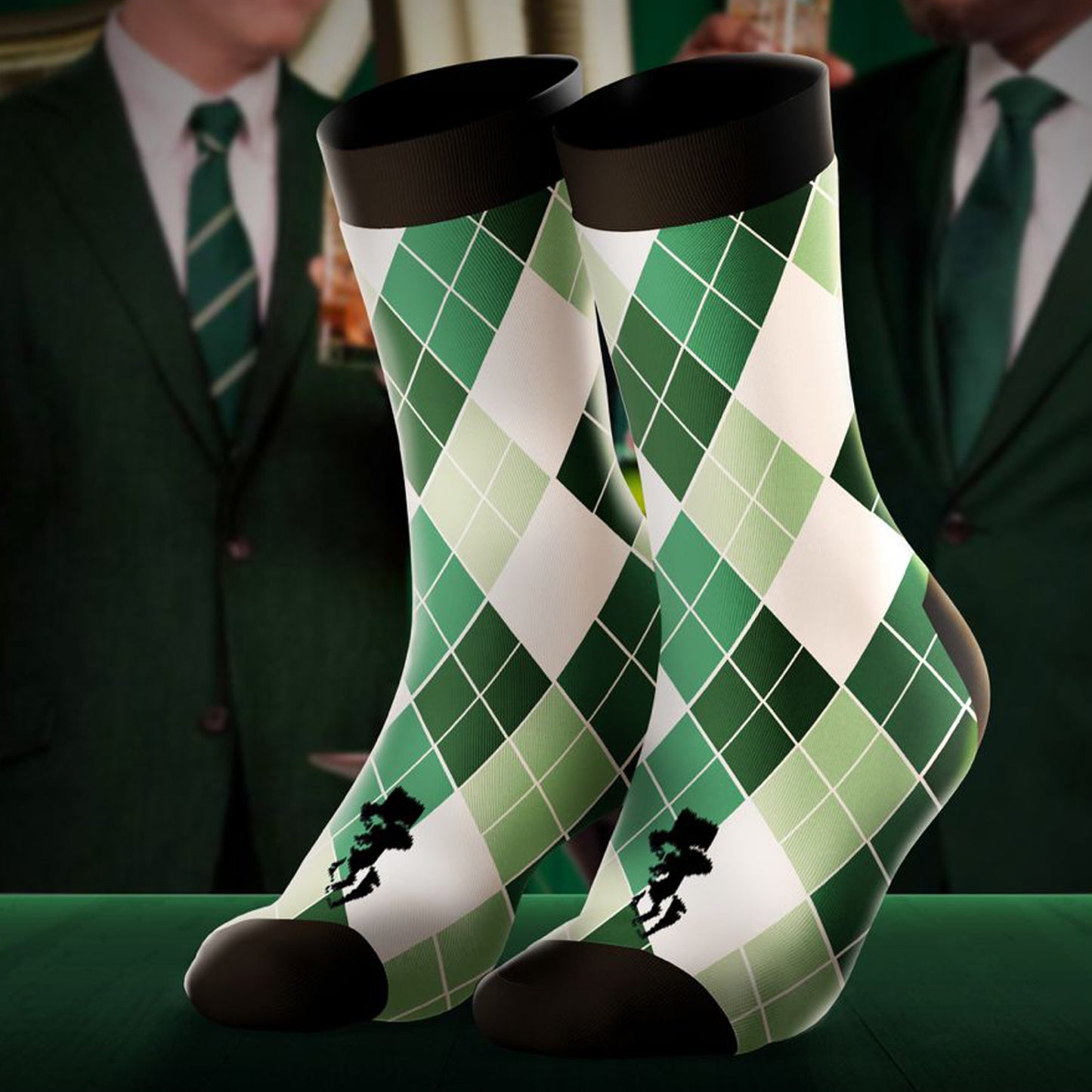 Green and white argyle patterned socks with black accents on a green background.