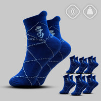 Blue socks with a pattern on a gray background